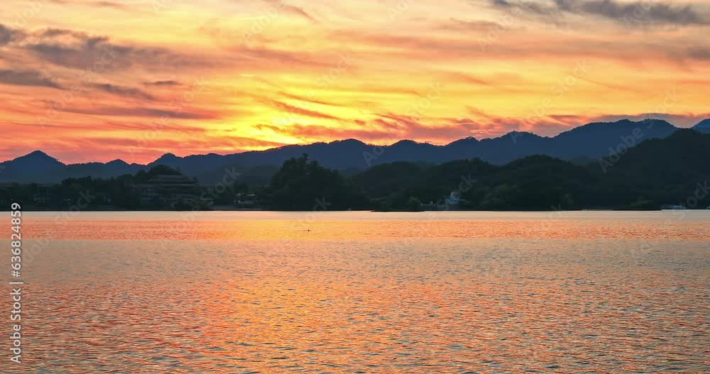 Beautiful lake and mountain with colorful sky clouds at sunset in Thousand Island Lake, Chun'an, Hangzhou, Zhejiang Province, China. Beautiful lake and mountain with colorful sky clouds at sunset in Thousand Island Lake, Chun'an, Hangzhou, Zhejiang Province, China.