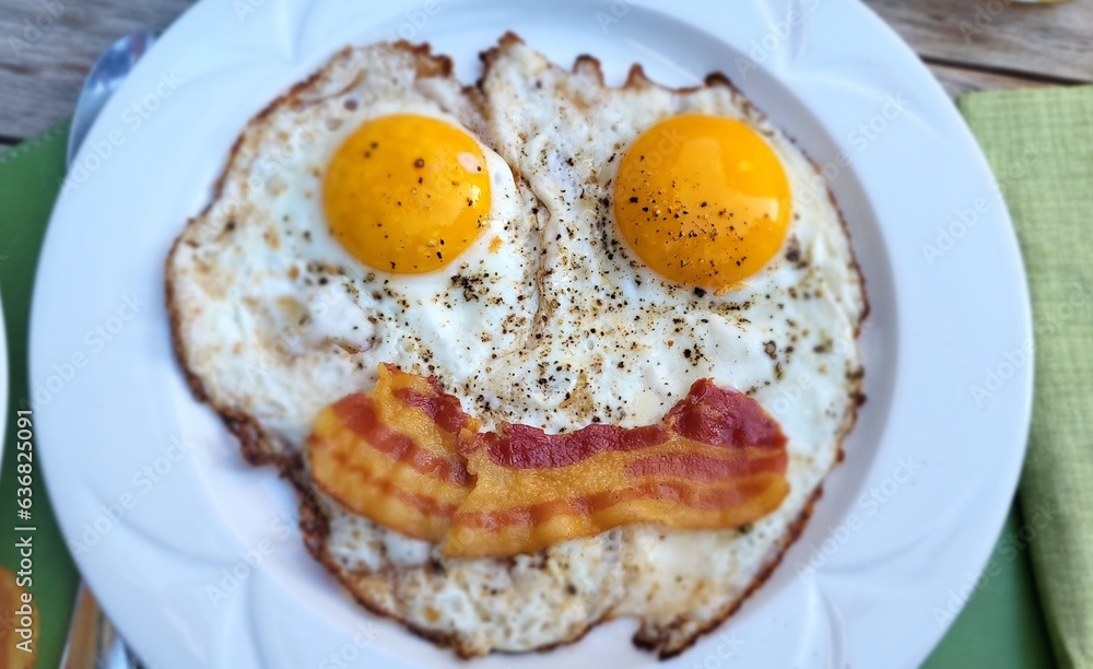 Smiley fried egg with bacon Smiley fried egg with bacon