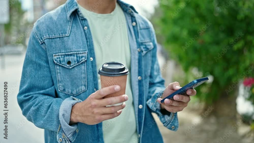 Young caucasian man using smartphone drinking coffee at park Young caucasian man using smartphone drinking coffee at park