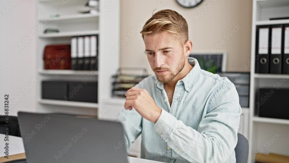 Young caucasian man business worker using laptop working at office Young caucasian man business worker using laptop working at office