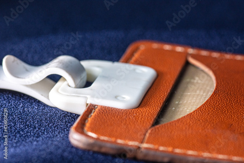 Elegant Identification: Close-up Shot of Brown Leather Nametag photo