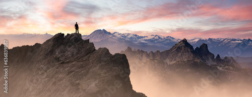 Epic Adventure Composite of Man Hiker on top of a rocky mountain.
