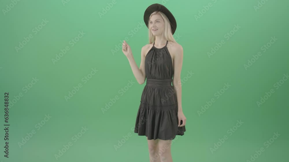 Happy wow effect blonde girl slides products on internet on touch screen - 4K Green Screen Video Happy wow effect blonde girl slides products on internet on touch screen - 4K Green Screen Video