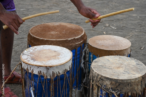African Street Musician Playing Drums