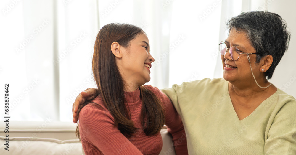 Portrait of enjoy happy love asian family senior mature mother and young daughter smiling play laughing and having fun together at home, care, elderly, insurance.happy family and Mother Day concept Portrait of enjoy happy love asian family senior mature mother and young daughter smiling play laughing and having fun together at home, care, elderly, insurance.happy family and Mother Day concept