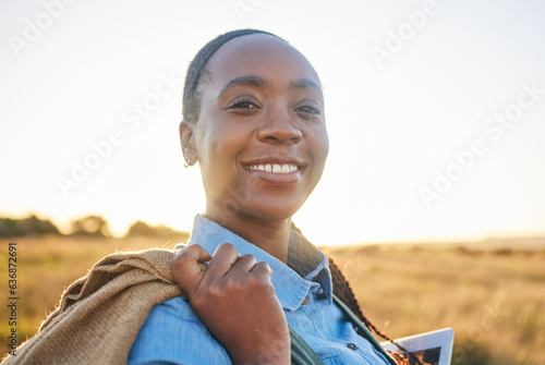 Agriculture, sunset and portrait of black woman on farm for environment, sustainability and plant. Garden, grass and nature with person in countryside field for ecology, production and soil health