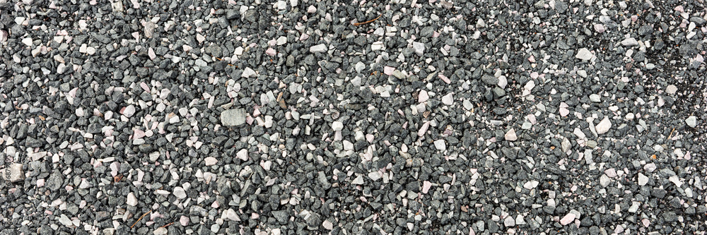 Gray and white pebble stones as background. Panorama Gray and white pebble stones as background. Panorama