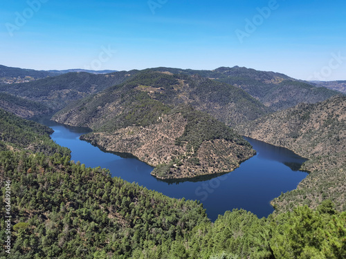 Entre montes e montanhas o rio Tua visto do miradouro, Olhos do Tua em Castanheiro do Norte, Portugal photo