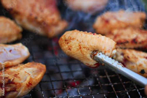 Ready-to-eat chicken drumsticks picked up from the camping stove.