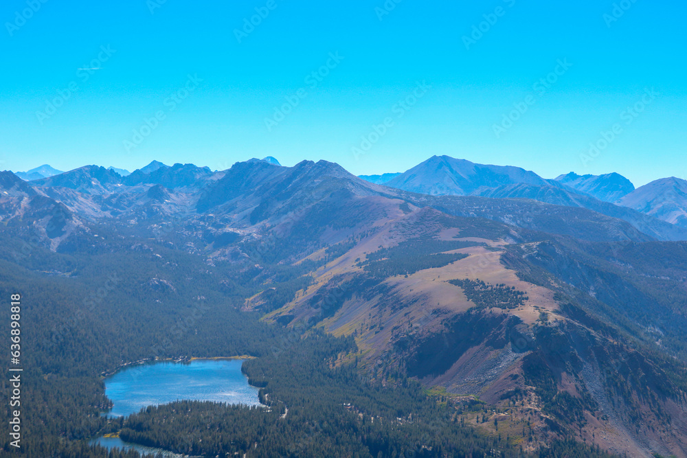 A beautiful view from a height of a mountain lake and mountains in America.
