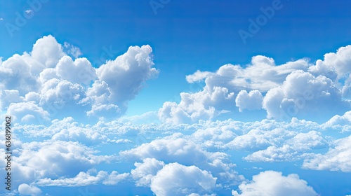 Image of white, fluffy clouds in blue sky