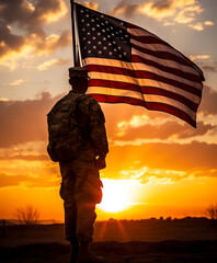 Soldier and USA flag on sunrise background . Veterans Day.