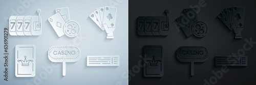 Set Casino signboard, Hand holding playing cards, Joker, Deck of, Playing glass whiskey with ice cubes and Slot machine lucky sevens jackpot icon. Vector