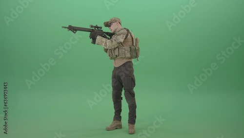 Counter strike army police man shooting enemy from machine gun in Camouflage uniform on green screen 4K Video Footage (ID: 636903443)