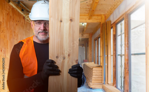 Man builder. Guy with board...