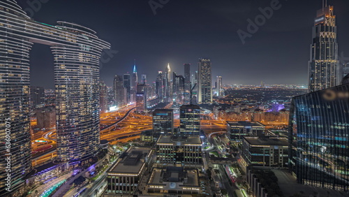 Photography Panorama showing futuristic Dubai Downtown and finansial district skyline aerial night timelapse