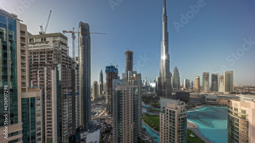 Panorama showing Dubai Downtown cityscape with tallest skyscrapers around aerial timelapse.