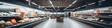 Inviting panoramic view of an empty supermarket aisle, devoid of customers - a poignant echo of tranquil solitude.