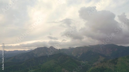 Hyperlapse-panorama of floating clouds over the mountains