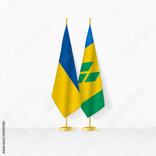 Ukraine and Saint Vincent and the Grenadines flags on flag stand, illustration for diplomacy and other meeting between Ukraine and Saint Vincent and the Grenadines.