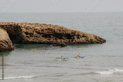 people surfing on the veach photo