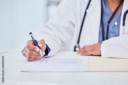 Doctor, hands and writing, health insurance paperwork and compliance with trust, help and healthcare at hospital. Test results, medical report and person with info on document, policy and closeup