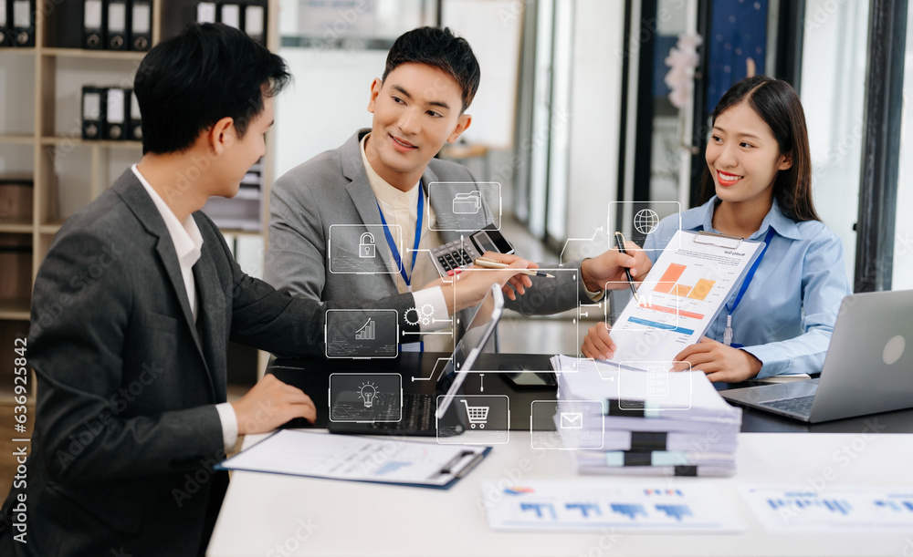 Obraz premium Business team partnership meeting concept. Business hand using laptop, tablet and smartphone in office. Digital marketing media mobile app in virtual icon screen
