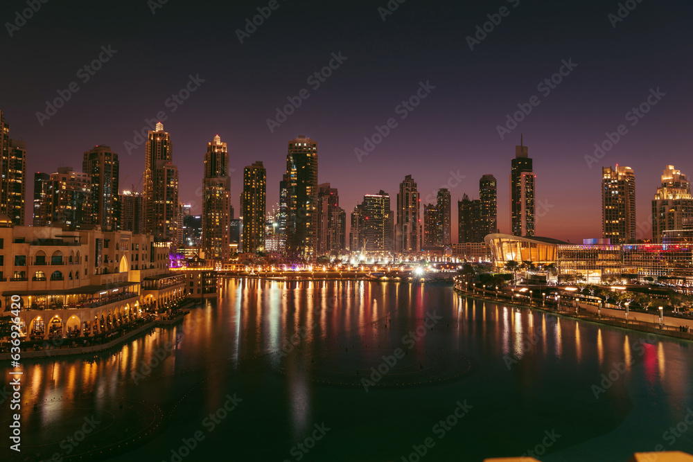 Fototapeta premium Unique view of Dubai Dancing Fountain show at night. 