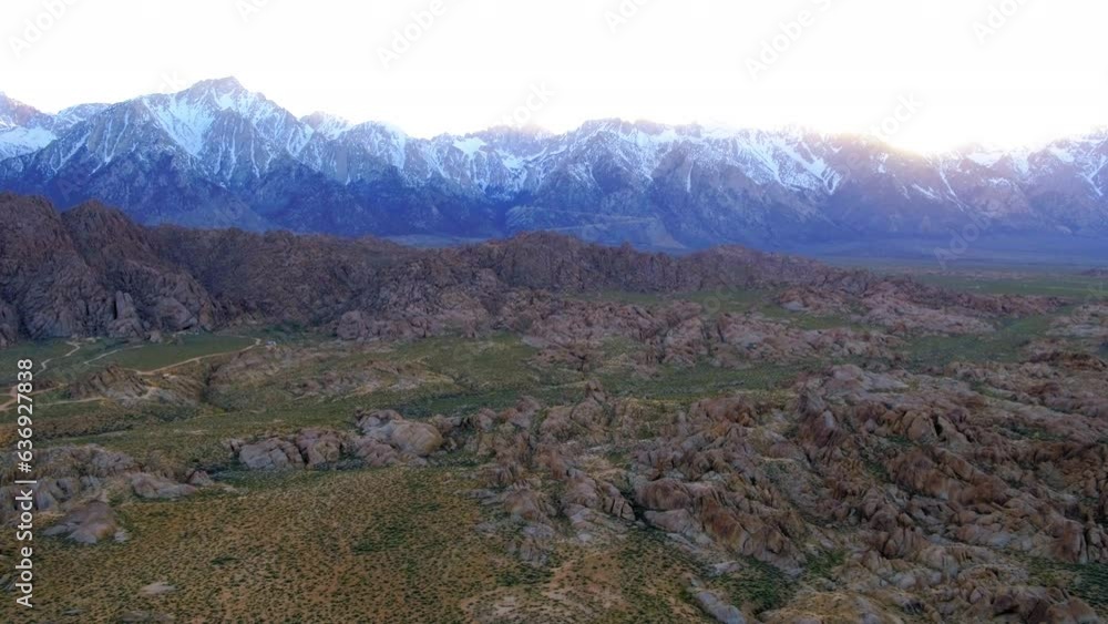 Aerial Shot Of Idyllic Mountains Against Sky, Drone Flying Forward Over Landscape During Sunrise - Alabama Hills, California Aerial Shot Of Idyllic Mountains Against Sky, Drone Flying Forward Over Landscape During Sunrise - Alabama Hills, California