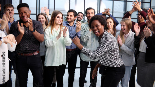 Business people clapping their hands after a seminar