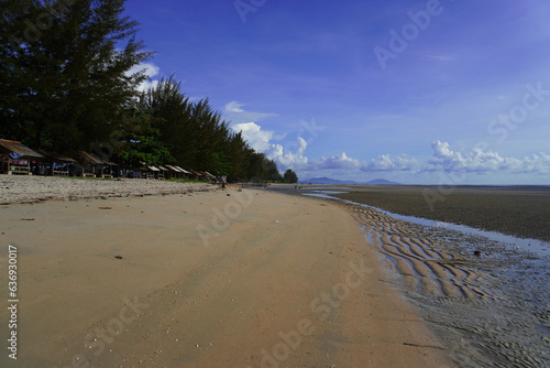 beach photo landscape with puddles of water on the beach sand