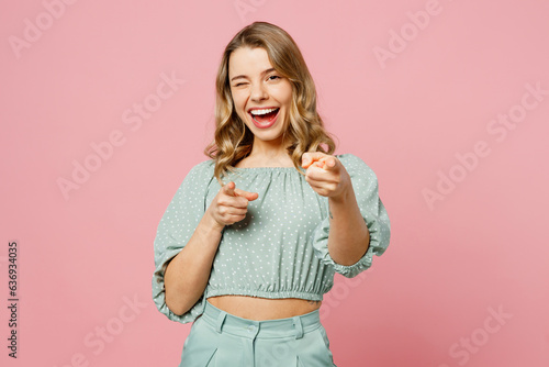 Fotografie Young confident leader happy woman wear casual clothes point index finger camera