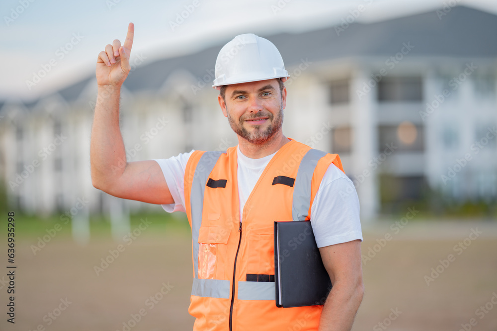 Builder at construction site. Buider with helmet on construction outdoor. Worker at construction site. Bilder in hardhat. Builder at construction site. Buider with helmet on construction outdoor. Worker at construction site. Bilder in hardhat.