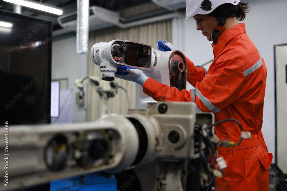 Mechanical engineer or technician do repair and maintenance robot Mechanical engineer or technician do repair and maintenance robot
