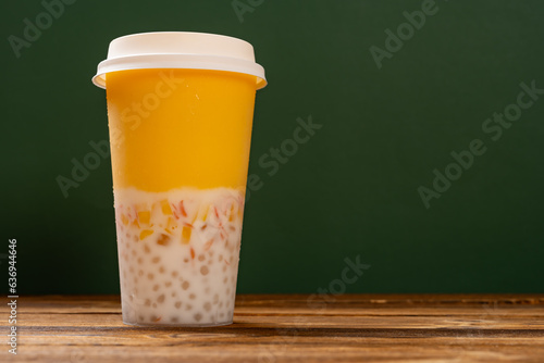 cup of mango pomelo sago dessert horizontal composition