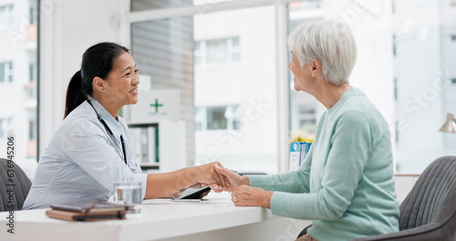 Doctor handshake  senior woman and healthcare with thank you in a hospital for medical care. Elderly consultation  smile and insurance conversation with women in a clinic office for retirement advice