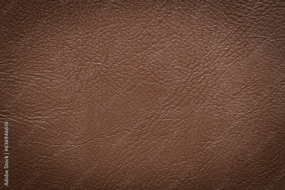 Brown leather texture closeup, useful as background Brown leather texture closeup, useful as background