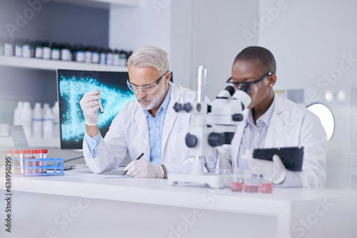 Black woman, man and microscope in lab with blood sample, tablet and test tube for medical study. Scientist team in laboratory for digital report, research and innovation in dna technology in science