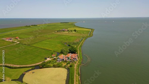 High angle Drone Point of View on former Dutch Island Marken in North Holland, The Netherlands on sunny spring day photo