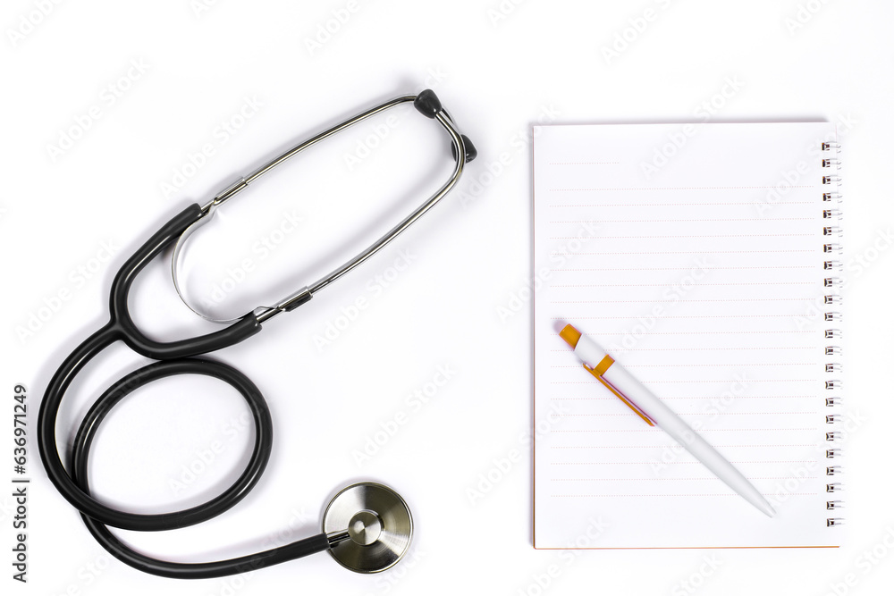 Doctor desk.Stethoscope notebook and pen on white background Doctor desk.Stethoscope notebook and pen on white background