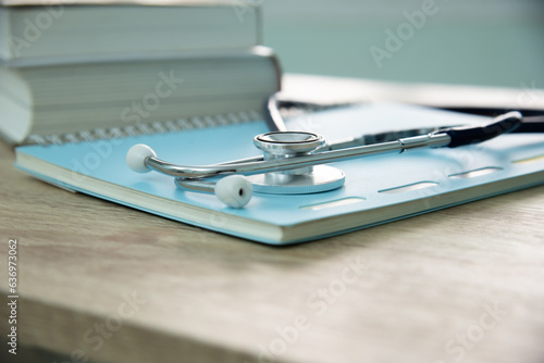 In a hospital setting, the presence of a doctor's physician book and stethoscope carries with it an air of professionalism and dedication to patient care.
