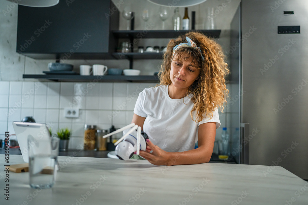adult caucasian woman adjust prepare home surveillance security camera adult caucasian woman adjust prepare home surveillance security camera