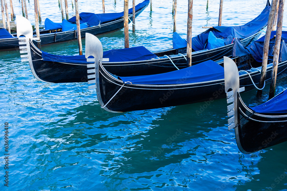 Gondolas moored side, Venice, Italy.