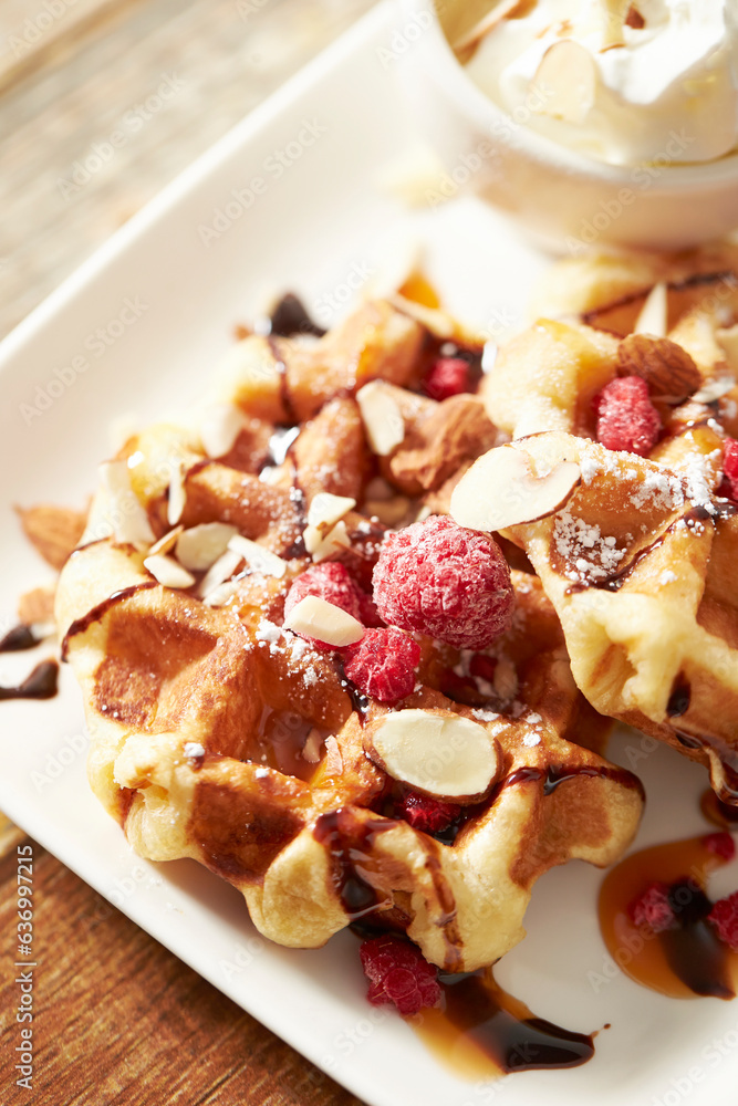 Waffles with nuts on a plate Waffles with nuts on a plate