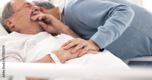 Hospital, sad or elderly couple, sick patient and hug for empathy, marriage bond and support for senior person. Healthcare crisis, whisper and man cough from medical problem, cancer or disease in bed