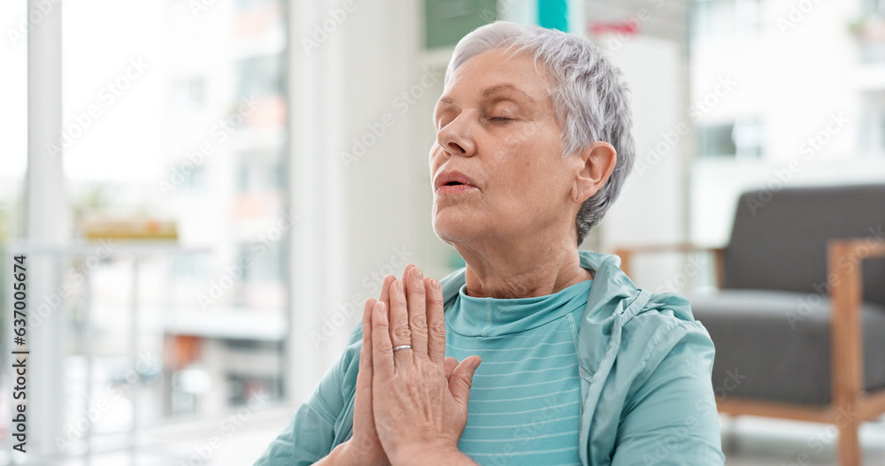 Yoga, namaste meditation and woman breathing for mindfulness, senior exercise or healing at home. Face of healthy old lady, breathe and meditate with prayer hands for zen, wellness and focus on peace Yoga, namaste meditation and woman breathing for mindfulness, senior exercise or healing at home. Face of healthy old lady, breathe and meditate with prayer hands for zen, wellness and focus on peace