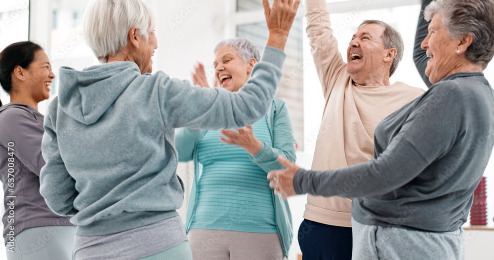 Obraz premium Fitness, hands together and senior people for exercise support, celebration and teamwork in workout class. Exercise, training goal and group of elderly man and women with high five for health success