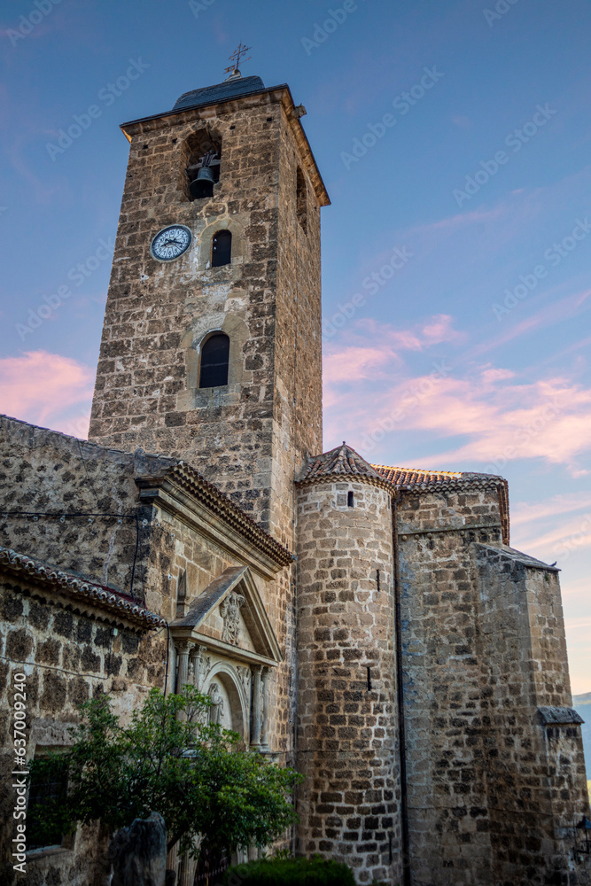 Vertical photo of the Church of the Assumption of Yeste, Albacete, Spain with evening light Vertical photo of the Church of the Assumption of Yeste, Albacete, Spain with evening light
