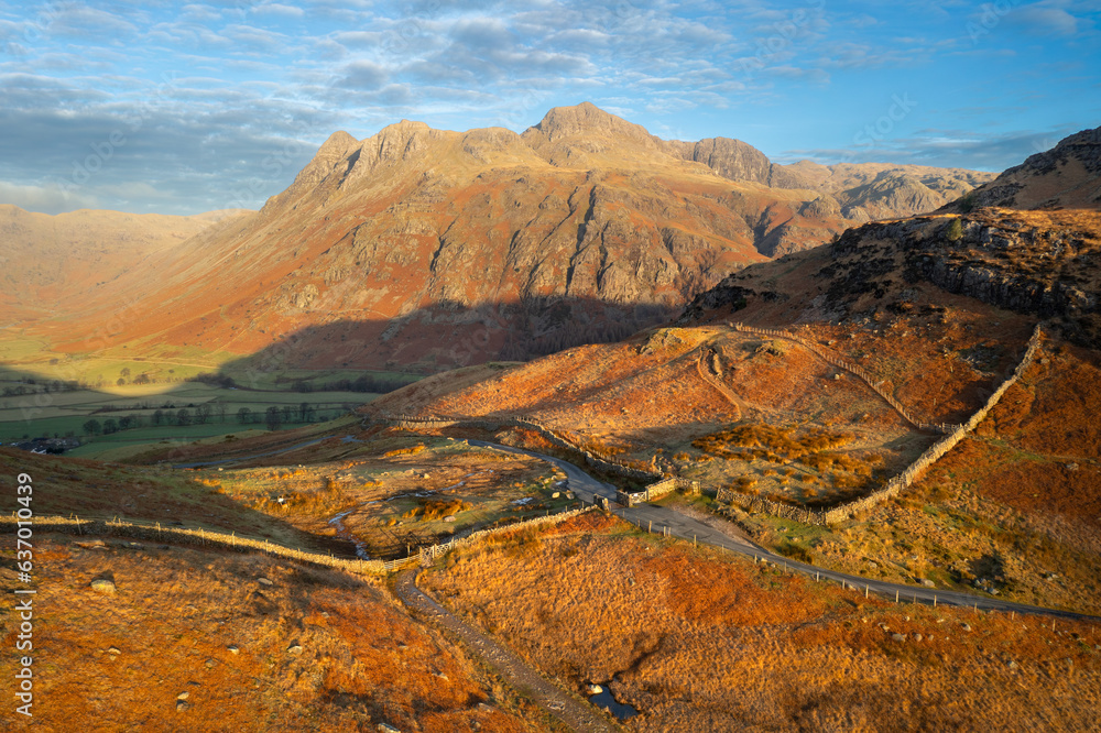 Aerial view of The Langdale Valley with Winter sunlight on mountains, Lake District, UK.