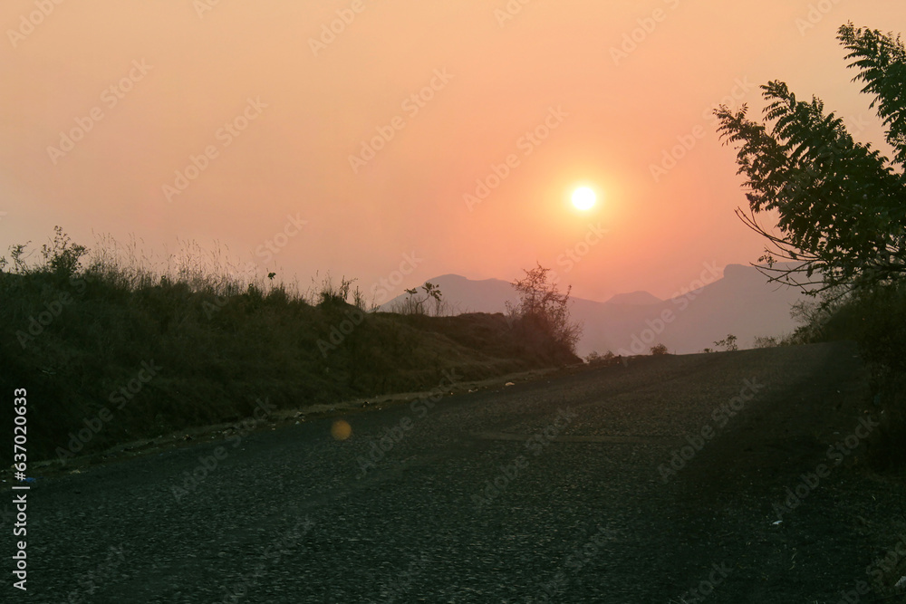 Country road and green farmland natural scenery at dawn in Igatpuri, Maharashtra, Mumbai. Country road and green farmland natural scenery at dawn in Igatpuri, Maharashtra, Mumbai.
